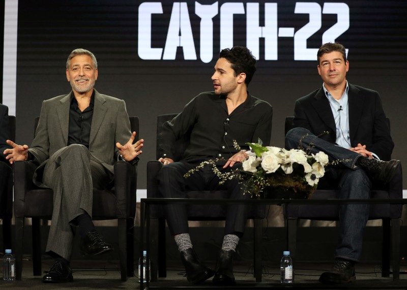 Actor, executive producer, and director George Clooney, actor Christopher Abbott, and actor Kyle Chandler speak on a panel for the Hulu series 