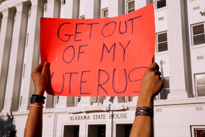 FILE PHOTO: Pro-choice supporters protest in front of the Alabama State House as Alabama state Senate votes on the strictest anti-abortion bill in the United States at the Alabama Legislature in Montgomery