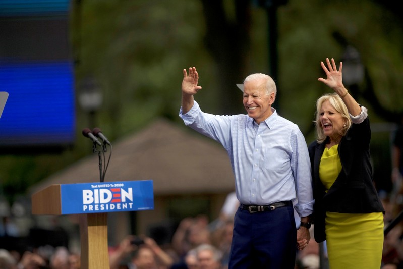 Democratic 2020 U.S. presidential candidate and former Vice President Joe Biden and wife, Dr. Jill Biden wave to supporters after speaking during a campaign stop in Philadelphia