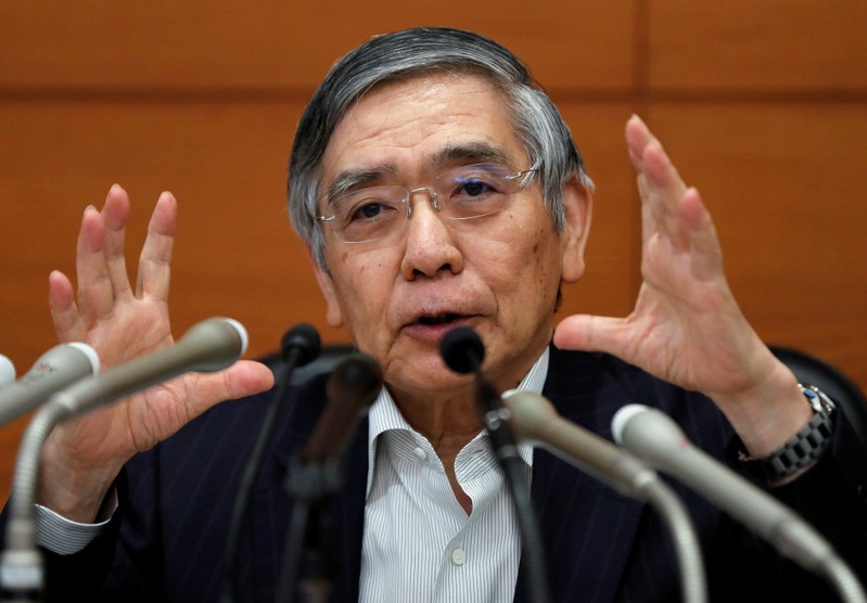 FILE PHOTO: BOJ Governor Kuroda speaks during a news conference at the BOJ headquarters in Tokyo