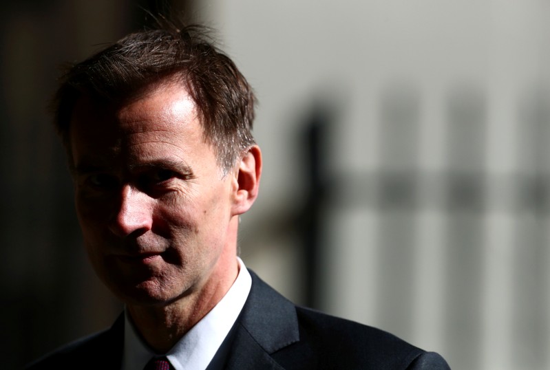 FILE PHOTO: Britain's Foreign Secretary Jeremy Hunt is seen outside Downing Street in London