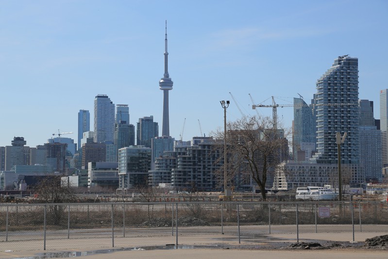 FILE PHOTO: The downtown skyline and CN Tower are seen past the eastern waterfront area of Toronto