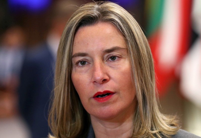 EU High Representative for Foreign Affairs and Security Policy Federica Mogherini talks to media at the European Council headquarters before a meeting with Chinese Foreign Minister Wang Yi, in Brussels