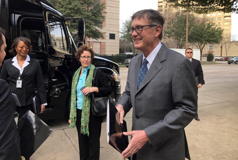 Federal Reserve Vice Chairman Clarida boards a bus to tour South Dallas as part of a community outreach by U.S. central bankers in Dallas
