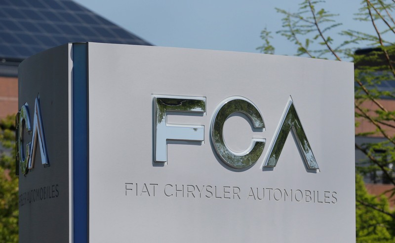 FILE PHOTO: A Fiat Chrysler Automobiles (FCA) sign is seen at its U.S. headquarters in Auburn Hills, Michigan