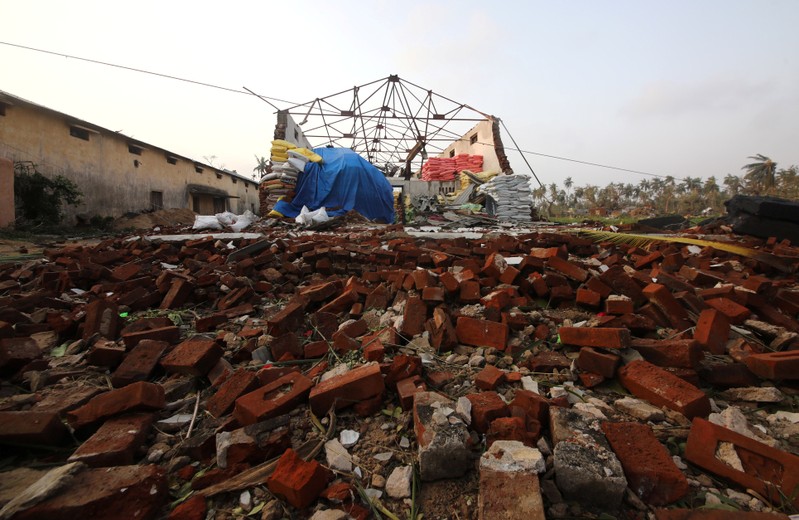 FILE PHOTO - A damaged warehouse is pictured following Cyclone Fani in Puri district