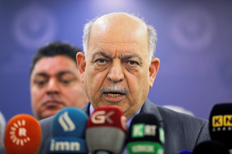 Iraqi Oil Minister Thamer Ghadhban speaks to the media at the ministry's headquarters in Baghdad