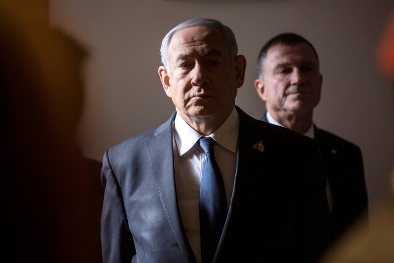 FILE PHOTO: Israeli Prime Minister Benjamin Netanyahu arrives to a ceremony on Memorial Day, when Israel commemorates its fallen soldiers, at Mount Herzl in Jerusalem