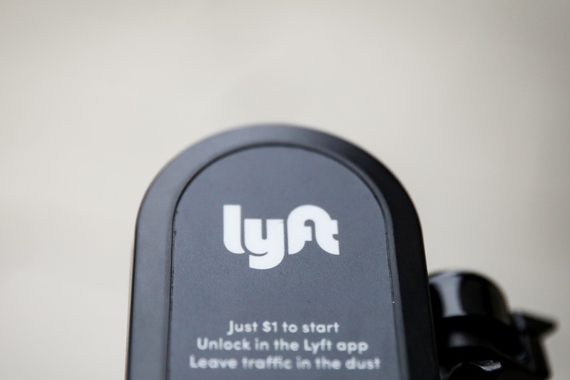 FILE PHOTO: The Lyft logo is seen on a parked Lyft Scooter in Washington