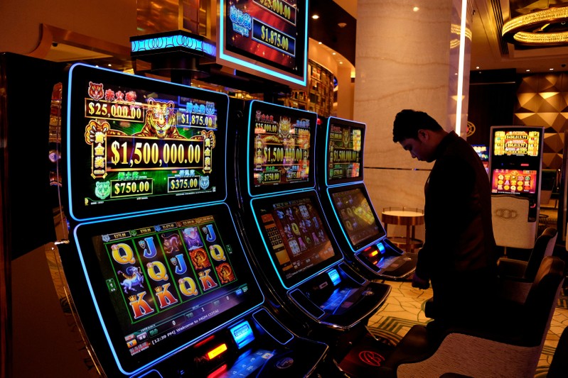FILE PHOTO: Gaming machines are installed at the casino of MGM Cotai in Macau