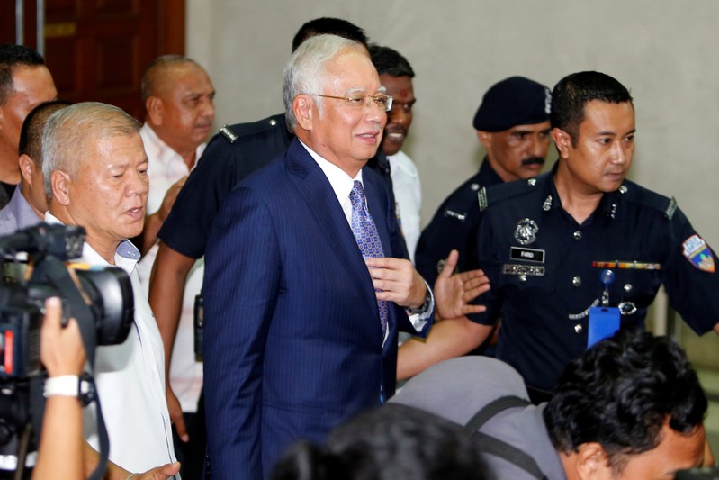 Former Malaysia's Prime Minister Najib Razak leaves Kuala Lumpur High Court in Kuala Lumpur