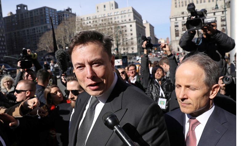 FILE PHOTO: Tesla CEO Elon Musk leaves Manhattan federal court after a hearing on his fraud settlement with the SEC in New York