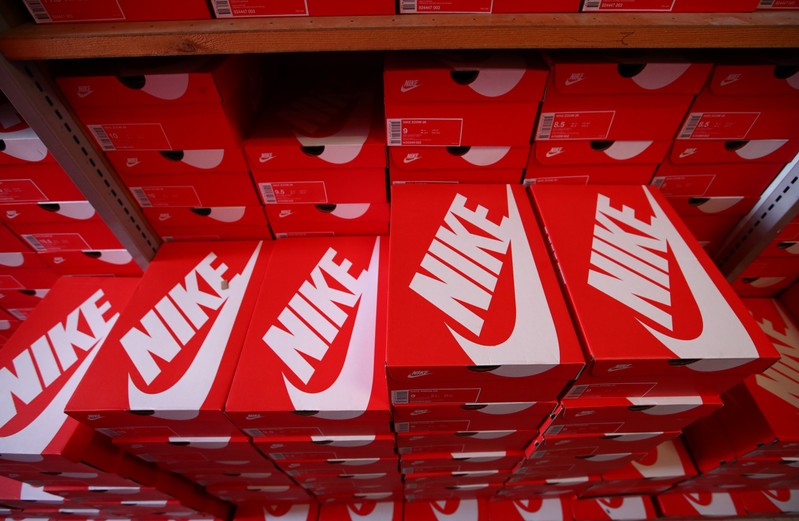 Boxes of Nike shoes are pictured in the warehouse of local footwear retailer 