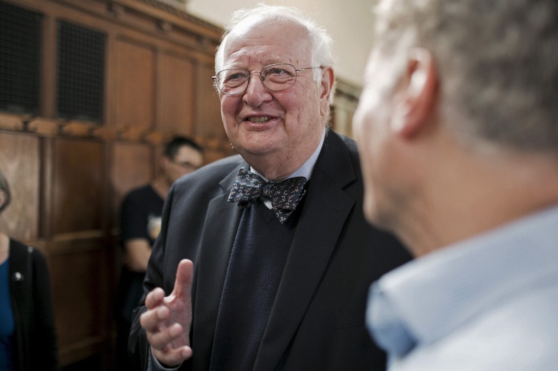 British-born economist Angus Deaton of Princeton University speaks with supporters at a reception after winning the 2015 economics Nobel Prize, at his home in Princeton
