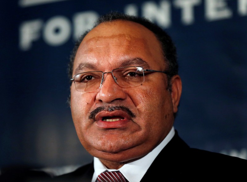 FILE PHOTO: Papua New Guinea's then Prime Minister Peter O'Neill makes an address to the Lowy Institute in Sydney, Australia