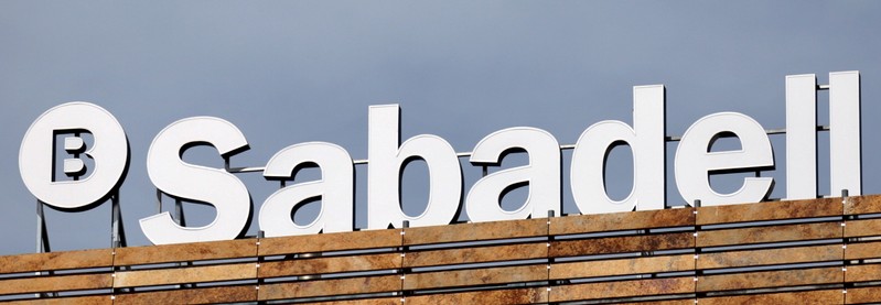 FILE PHOTO: The Banco Sabadell logo can be seen on top of a building outside Madrid, Spain