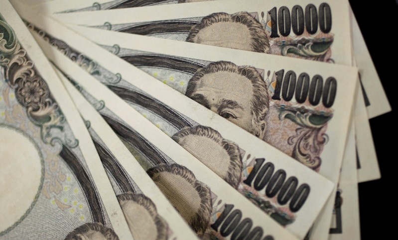 FILE PHOTO: A picture illustration shows Japanese 10,000 yen notes featuring a portrait of Yukichi Fukuzawa, the founding father of modern Japan