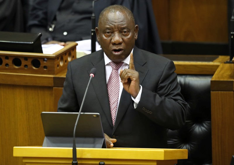 South African President Cyril Ramaphosa gestures as he speaks to lawmakers after parliament formally elected Ramaphosa as State President in Cape Town