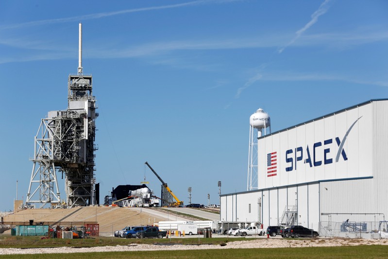 FILE PHOTO: A SpaceX Falcon 9 rocket, is readied for launch on a supply mission to the International Space Station on historic launch pad 39A at the Kennedy Space Center in Cape Canaveral