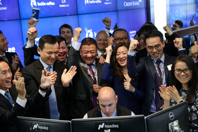 Jenny Qian Zhiya CEO of Luckin Coffee celebrates the company's stock trading during the IPO at the Nasdaq Market site in New York