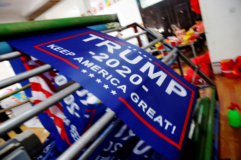 FILE PHOTO: Flags for U.S. President Donald Trump's 