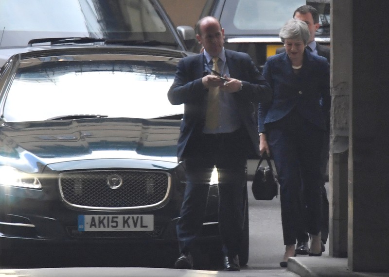 FILE PHOTO: Britain's Prime Minister May arrives at the Houses of Parliament in London