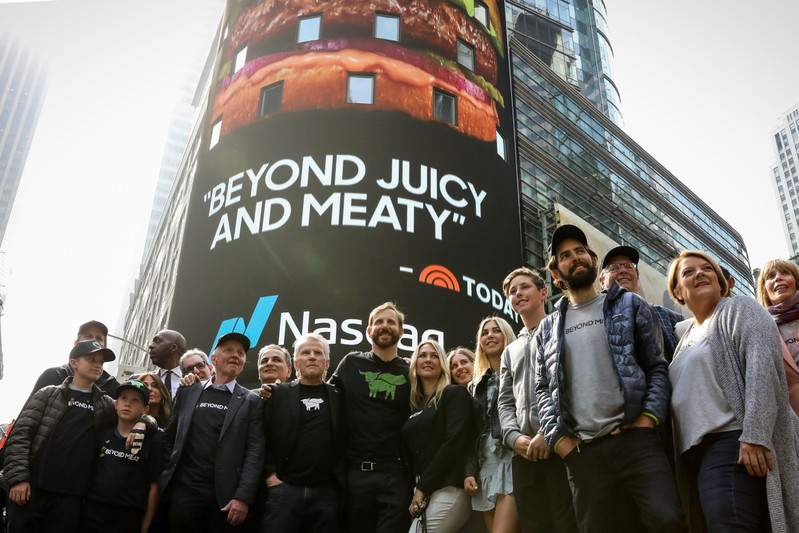 Ethan Brown, founder and CEO of Beyond Meat, poses with company executives and guests during the company's IPO at the Nasdaq Market site in New York