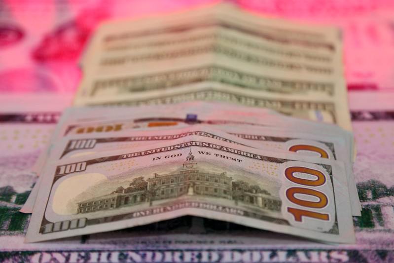 FILE PHOTO: U.S. dollar banknotes are pictured at a currency exchange office in Diyarbakir