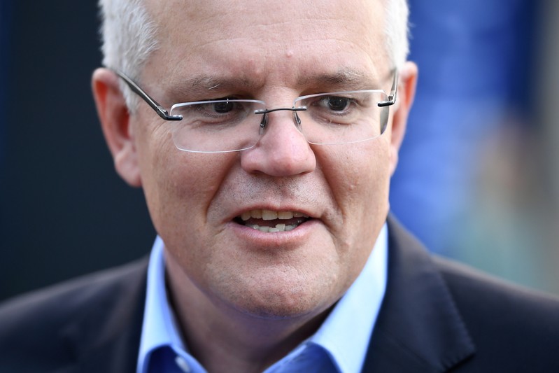 FILE PHOTO: Prime Minister Scott Morrison speaks to the media as he arrives at the Horizon Church in Sutherland in Sydney