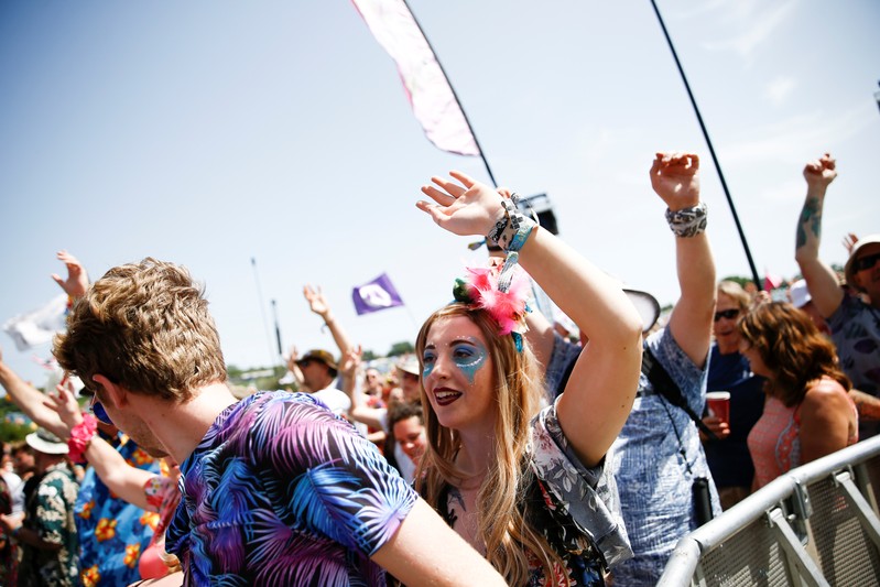 Festival goers in the crowd for the Pyramid Stage during Glastonbury Festival in Somerset