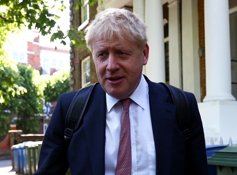 Former British Foreign Secretary Boris Johnson leaves his home in London