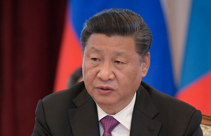 China’s President Xi Jinping attends a meeting with Russia’s President Vladimir Putin and Mongolia's President Khaltmaagiin Battulga on the sidelines of the SCO summit in Bishkek