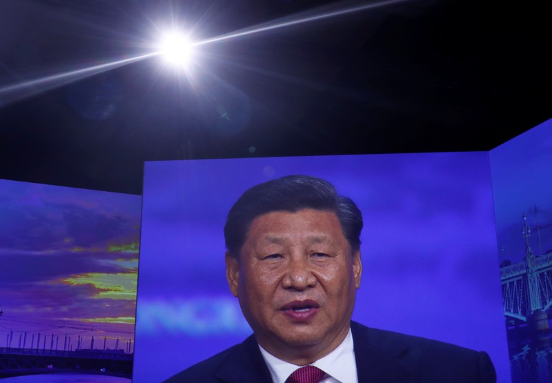 Chinese President Xi Jinping attends a session of the St. Petersburg International Economic Forum