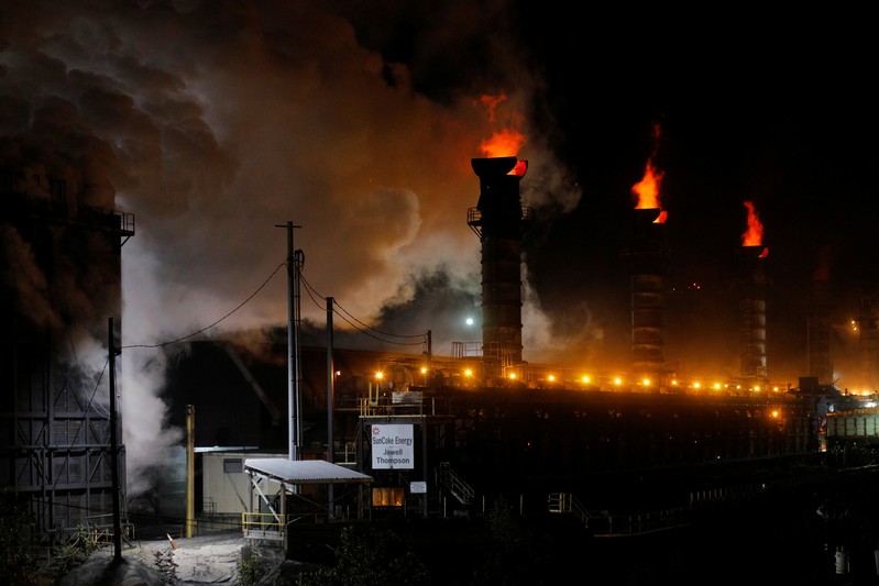 Flames and steam rise from the Suncoke Jewell cokemaking plant, which burns coal to make coke, in Oakwood, Virginia