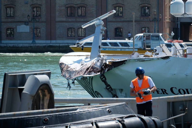A boat is seen after a crash with MSC Opera at San Basilio dock in Venice