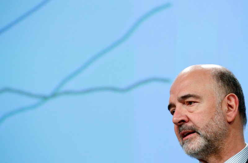 FILE PHOTO: EU Commissioner Moscovici presents the EU executive's economic forecasts in Brussels