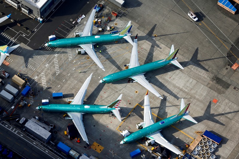 An aerial photo shows Boeing 737 MAX airplanes parked on the tarmac at the Boeing Factory in Renton