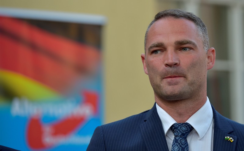 Right-wing party AfD candidate Sebastian Wippel reacts after the announcement of the results of the runoff mayoral election in Goerlitz