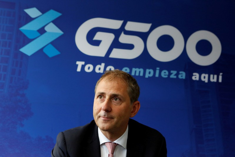 FILE PHOTO: Alex Beard, head of oil at trading firm Glencore, looks on during an interview after the opening of a gas station under the franchise G500 in Tlalnepantla