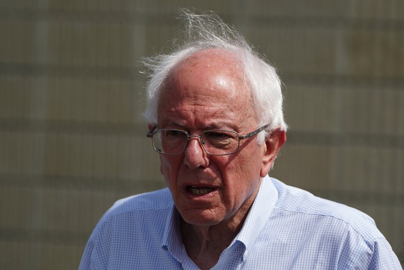 Candidate for President of the U.S. Bernie Sanders walks out of a detention facility for incarcerated youths near Miami in Homestead