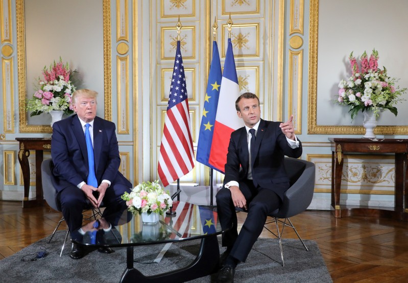 U.S. and French presidents meet on margins of D-Day commemorations