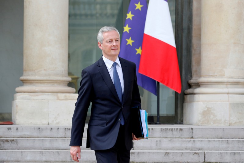 FILE PHOTO: French Finance Minster Bruno Le Maire leaves a cabinet meeting at the Elysee Palace