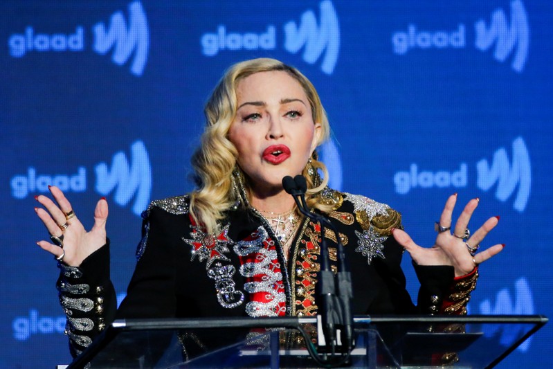 FILE PHOTO: Singer Madonna speaks to guests after receiving the Advocate for Change award during the 30th annual GLAAD awards ceremony in New York City, New York