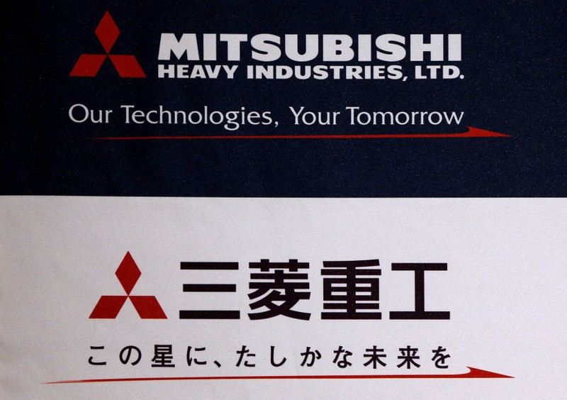 FILE PHOTO: The logo of Mitsubishi Heavy Industries is seen at the company's news conference in Tokyo
