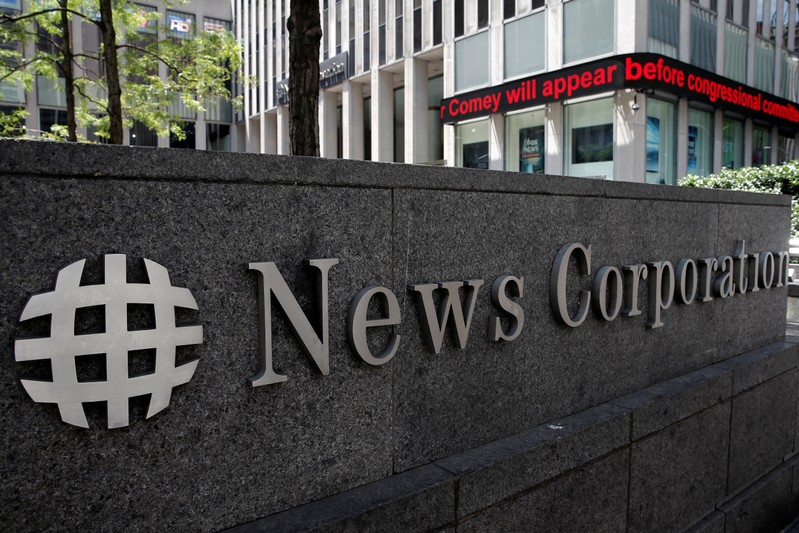 FILE PHOTO: The News Corporation logo is seen outside their headquarters building, home to Fox News, in New York
