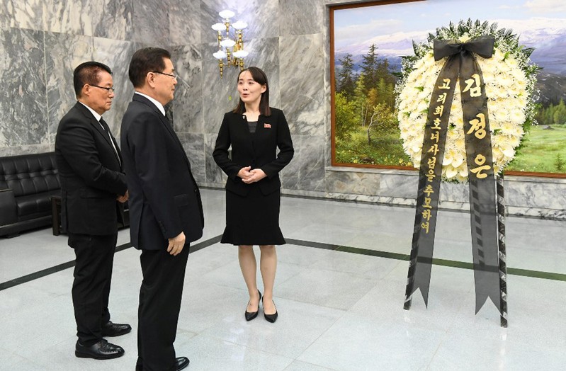 North Korean leader Kim Jong Un's sister Kim Yo Jong talks with South Korean presidential national security director Chung Eui-yong and lawmaker Park Ji-won near the condolence flowers for Lee Hee-ho, the widow of former South Korean President Kim Dae-ju