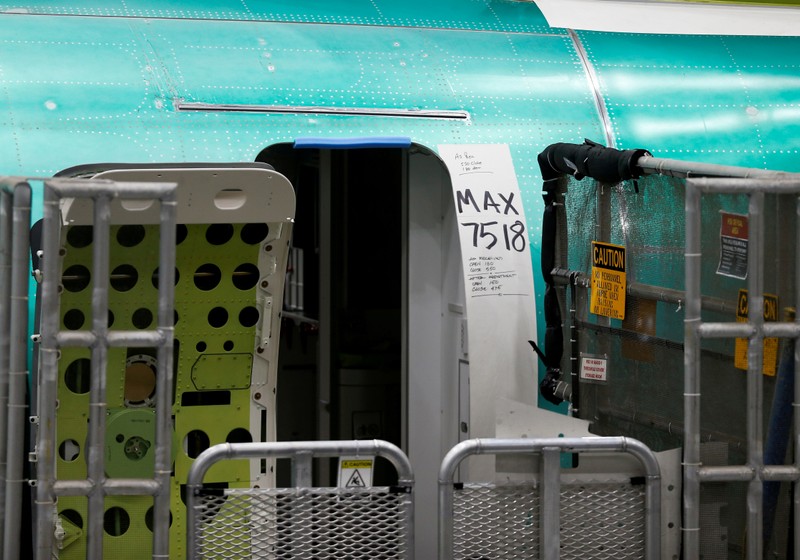 FILE PHOTO: A door of a 737 Max aircraft with production notes is seen at the Boeing factory in Renton