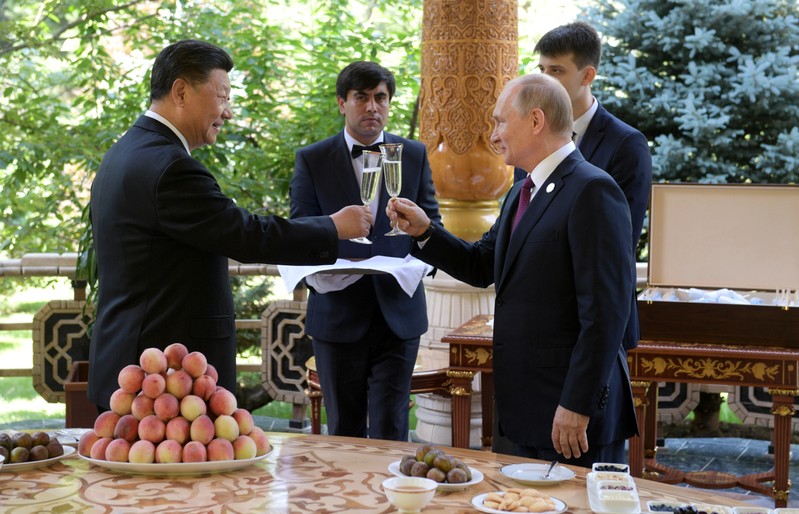 Russian President Vladimir Putin meets with Chinese President Xi Jinping before CICA summit in Dushanbe