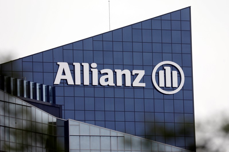 FILE PHOTO: The logo of insurer Allianz SE is seen on the company building in Puteaux at the financial and business district of La Defense near Paris
