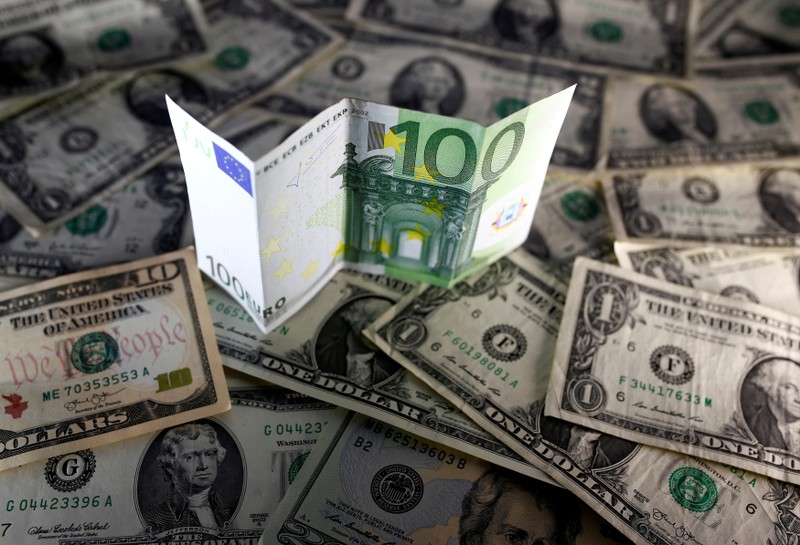 FILE PHOTO - U.S. dollar and Euro notes are seen in this picture illustration